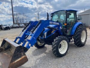 Pre-Owned New Holland Powerstar 75 4wd cab tractor w/ Front end loader